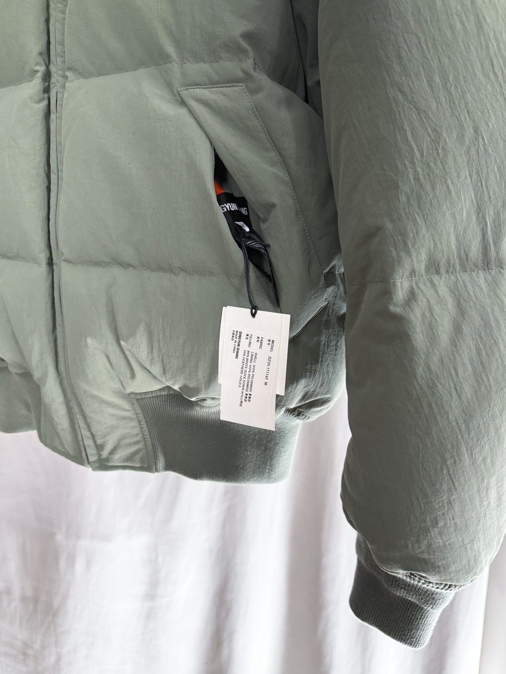 Dingyun Zhang AW25 Reversible Down Bomber